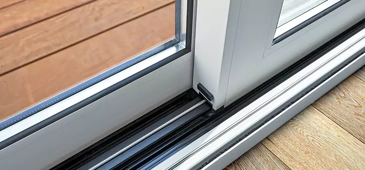 Why Your Sliding Door Keeps Getting Stuck in East Lansing, MI?